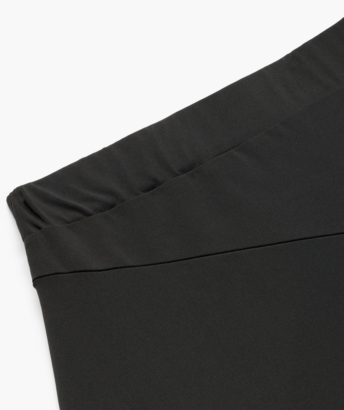 PERFORMANCE ASYMMETICAL SKIRT
